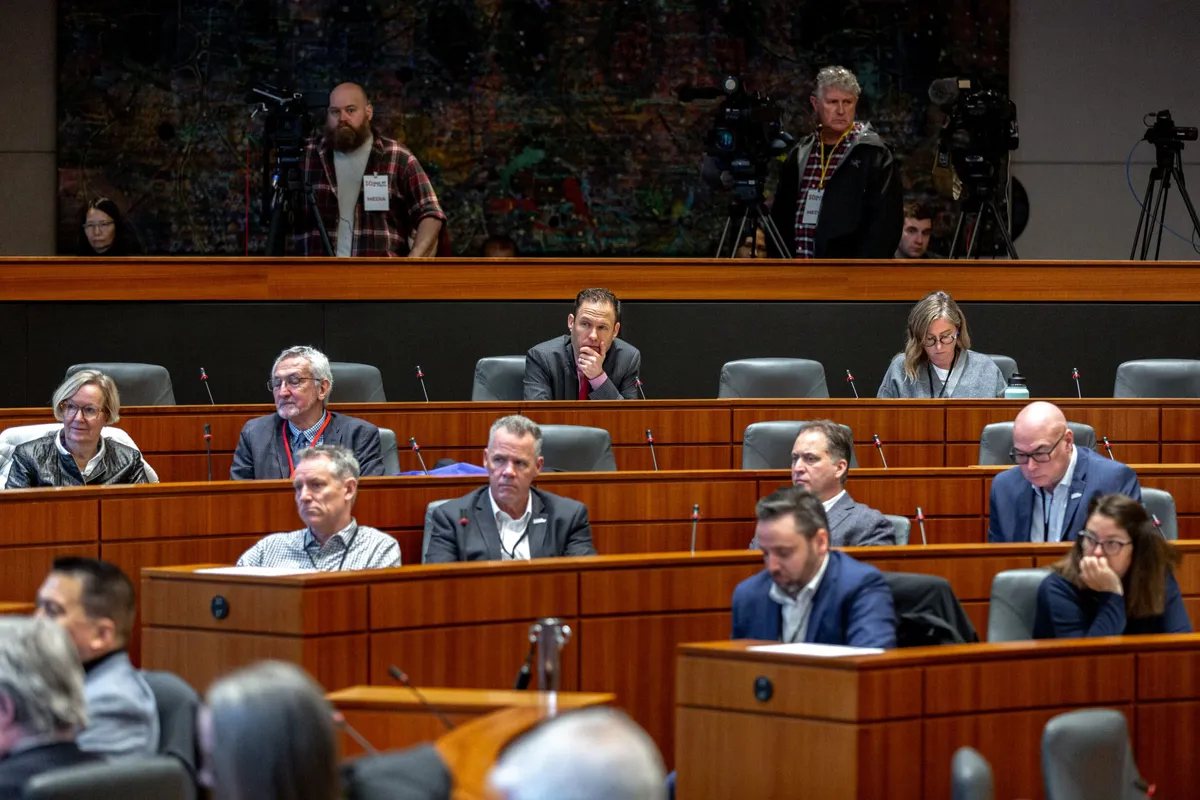 Attendees seated in tiers at the Communities Driving Change Forum